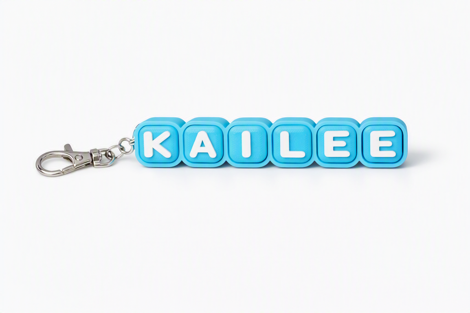 Blue and white personalized Kailee name clicker keychain